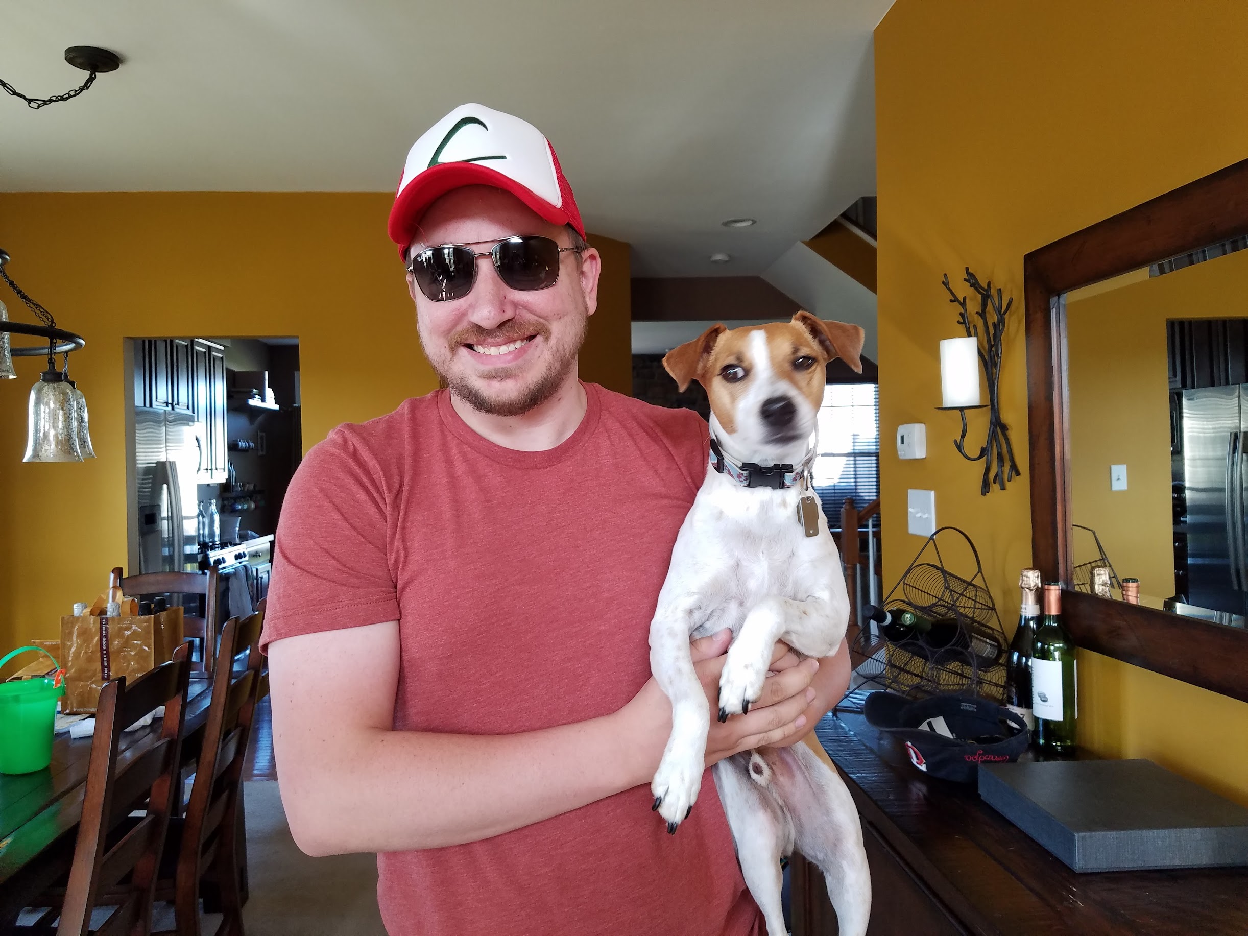 Eric holding Seymour indoors